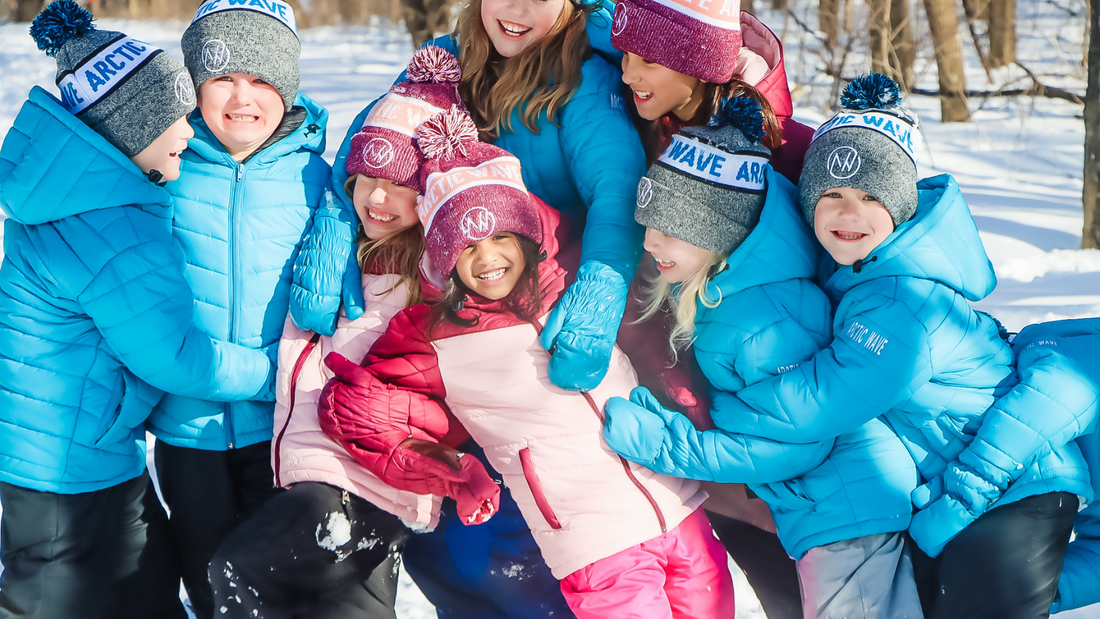 A child wearing a warm kids winter coat with attached mittens