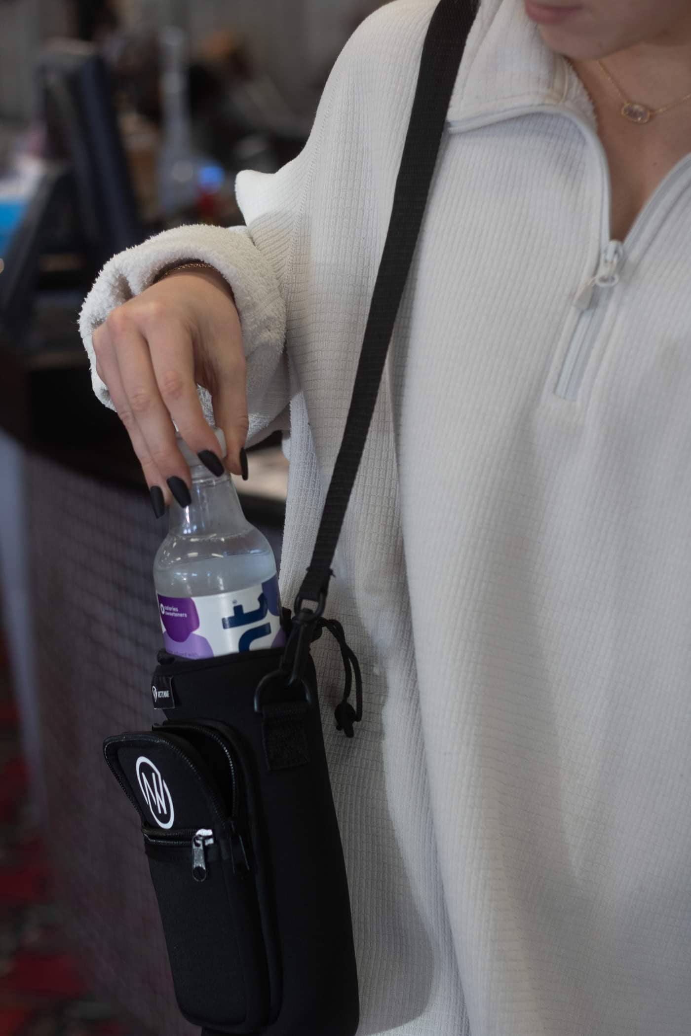 Water Bottle Cell Phone Carrier Bag with a Shoulder Strap